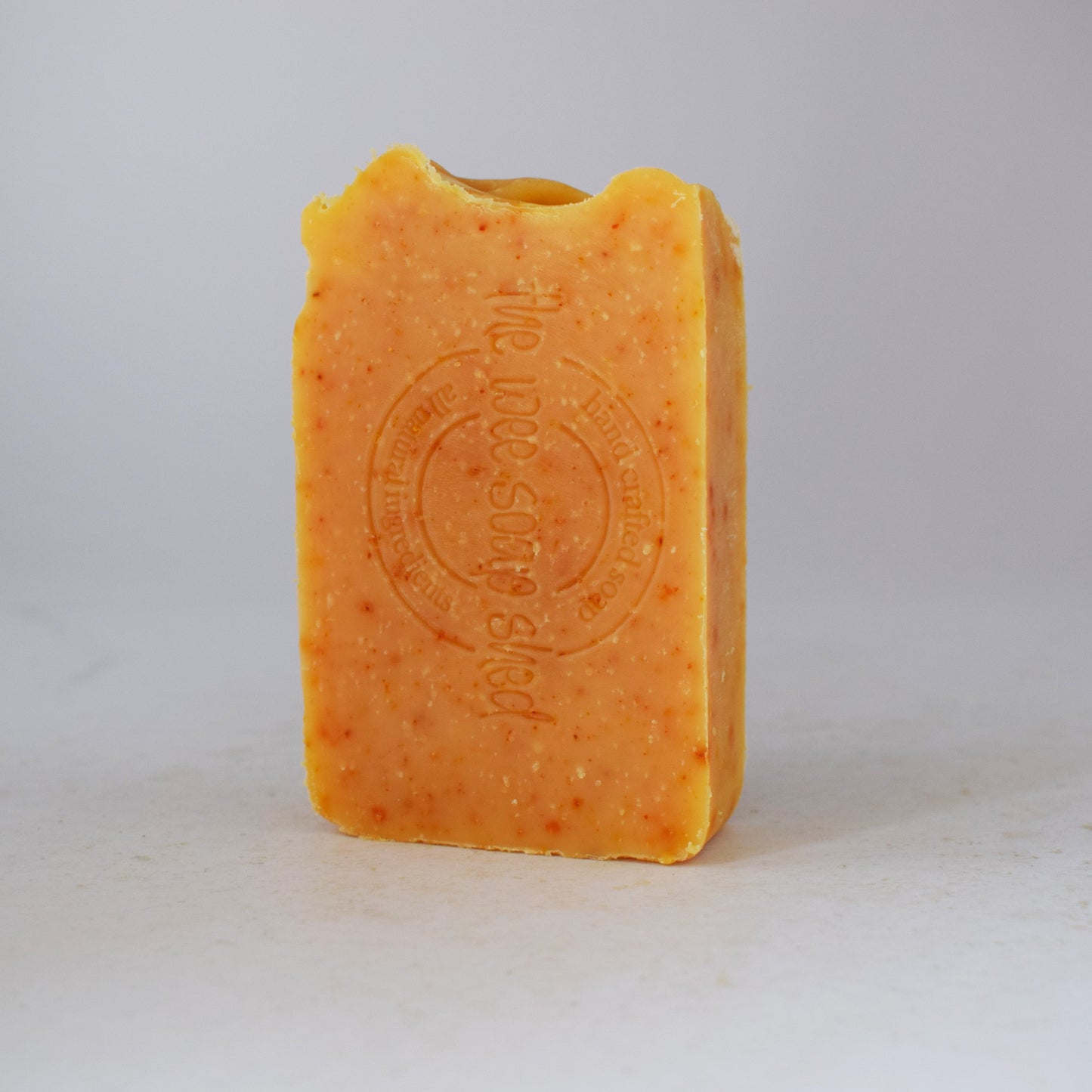 Yellow coloured tallow soap bar